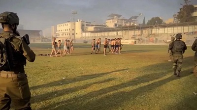 Imagens mostram crian&ccedil;as nuas e mulheres entre detidos em est&aacute;dio de Gaza